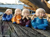 Set of 4 Decorative Baby Monk Statues – Peaceful Buddha Figurines for Home & Office Decor