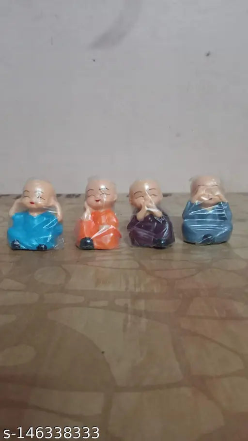Set of 4 Decorative Baby Monk Statues – Peaceful Buddha Figurines for Home & Office Decor